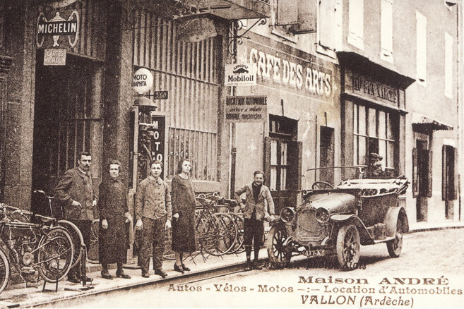 Charles André’s family in front of the cycle shop in Vallon Pont d'Arc in Ardèche